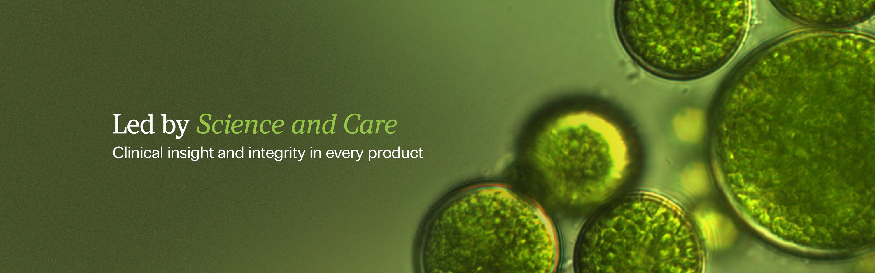 Microscopic view of green cells with text about science and care on a green background