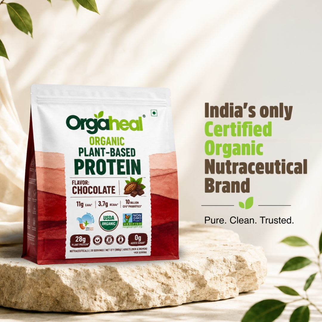 Orgaheal Organic Plant-Based Protein powder in Chocolate flavor, shown in a resealable pouch on a stone slab with promotional text on a light beige background.